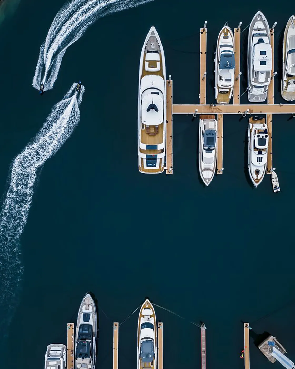 Modern motor yacht at a marina