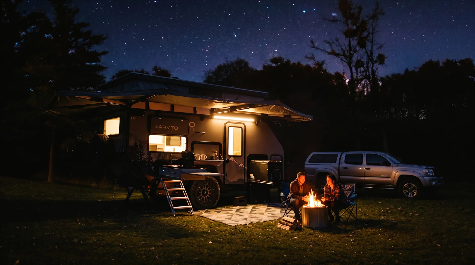 ARKTO trailer at a nighttime campsite